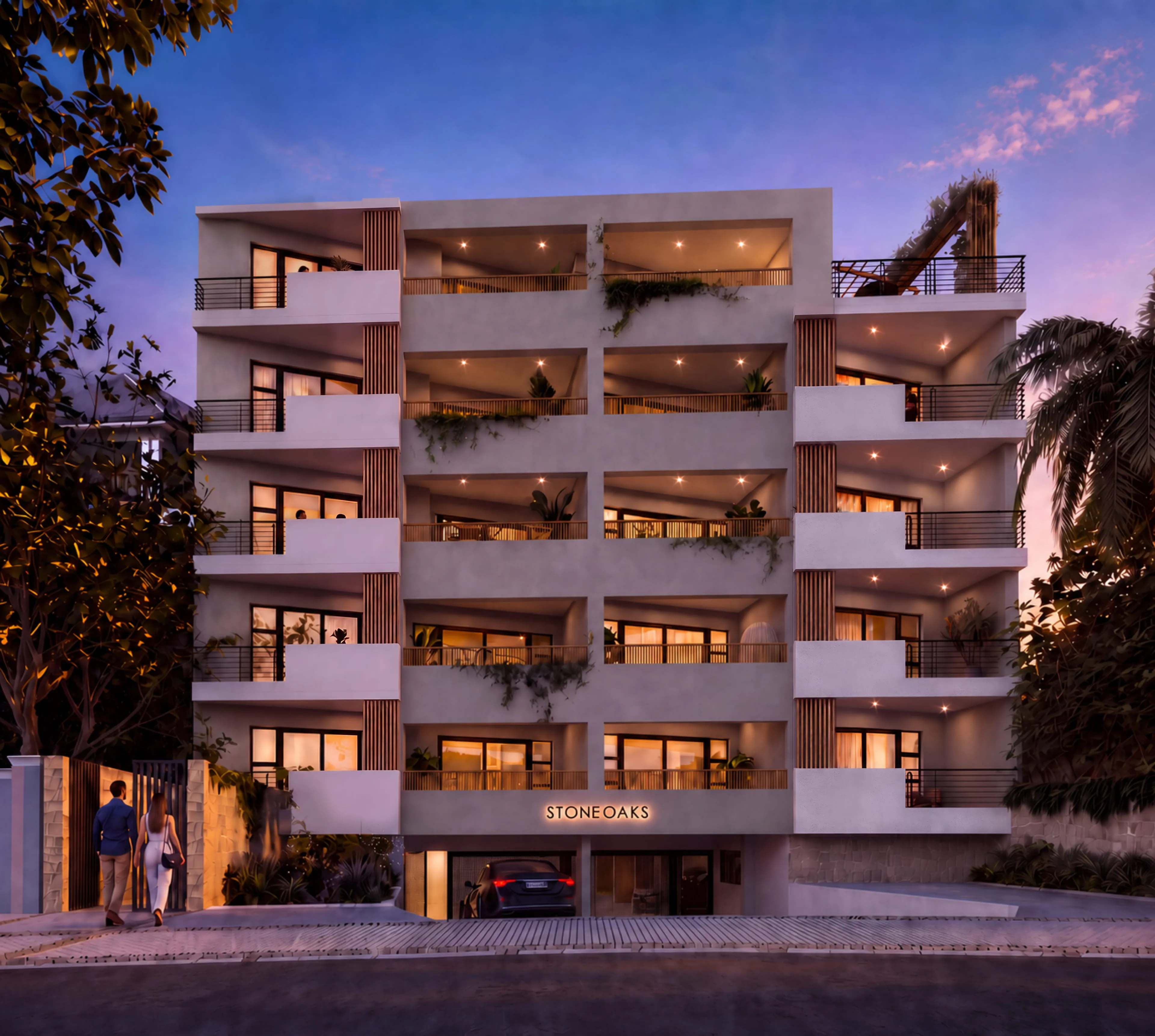 The Stone Oaks facade at dusk